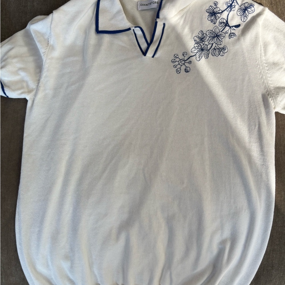 White Top with Blue Floral Embroidery